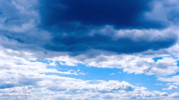 Timelapse of Cumulus Clouds Moving in the Blue Sky Cloud Space