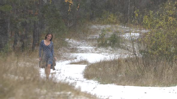 Girl in Forest and First Snow