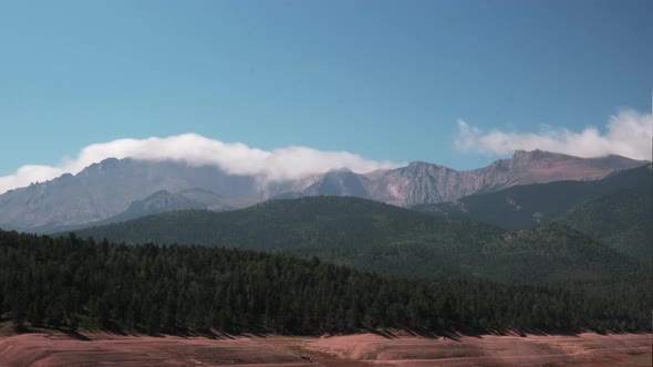 Static time lapse of clouds billowing over Pikes Peak in Colorado, USA.