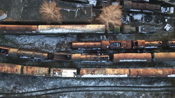 Top down Aerial view of old and abandoned locomotive depot in the sunny day. Polish railways. Pyskow