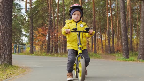 5-Year-Old Boy Riding Balance Bike