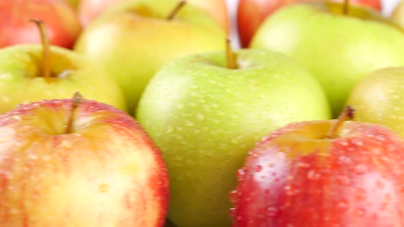 Bunch of Wet Apples on Table