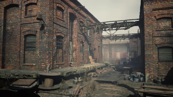 Abandoned Industrial Factory Buildings at Sunset alt