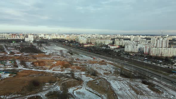 Construction site in a city vacant lot. Close to populated urban areas.