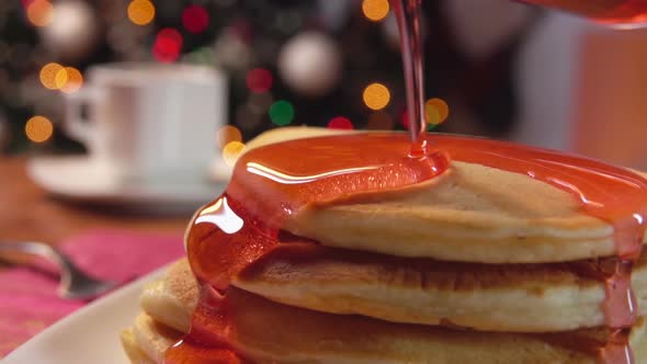 Pour Strawberry Syrup Pancakes