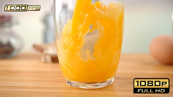 Orange Juice Swirling in the Glass