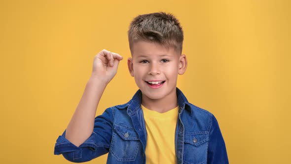 Portrait Happy Male Kid Exciting Pointing Forefinger Having Good Idea Solving Problem Posing