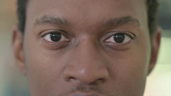 Close Up of Blinking Eyes of African Man