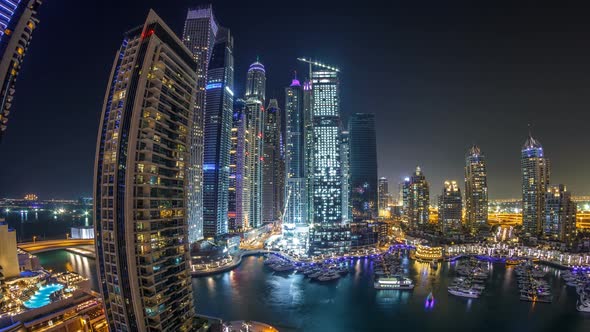 Dubai Marina at Night Timelapse Glittering Lights and Tallest Skyscrapers During a Clear Evening