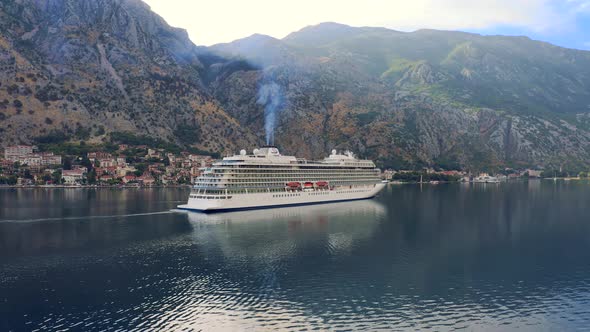 Cruise Liner Ship Swimming at Blue Adriatic Sea on Mountains Landscape Port of Kator Montenegro