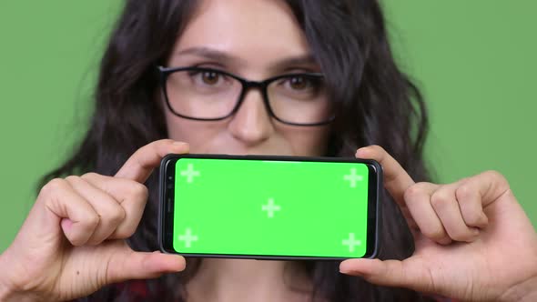 Young Beautiful Businesswoman Showing Phone