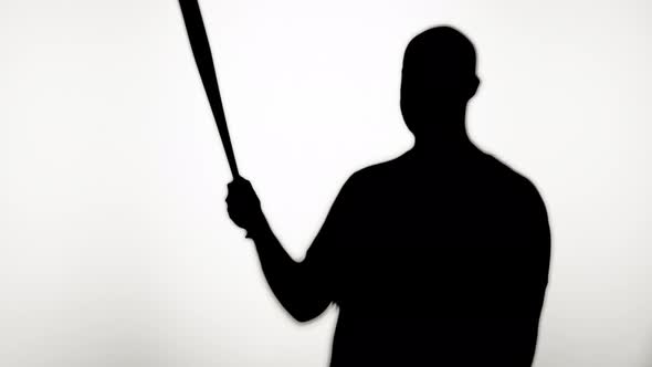 Man Holding Baseball Bat Closeup Shadow Silhouette of Hand with Weapon on White Background Sport