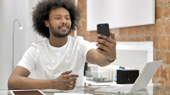 African Man Taking Selfie By Smartphone