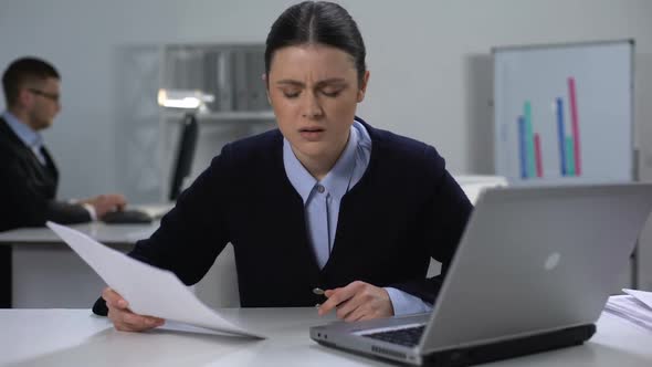 Female Office Manager Feeling Lower Back Pain on Workplace, Sedentary Lifestyle
