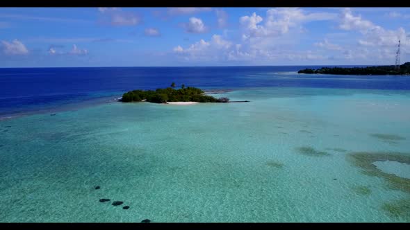 Aerial top down seascape of marine seashore beach holiday by turquoise water with white sandy backgr