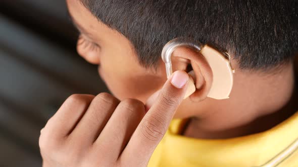 Hearing Aid Concept Teenage Boy with Hearing Problems