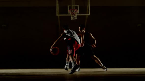 Competitors playing basketball in the court 4k