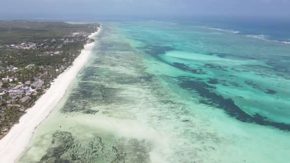 Aerial View of Low Tide in the Ocean Near the Coast of Zanzibar Tanzania Slow Motion