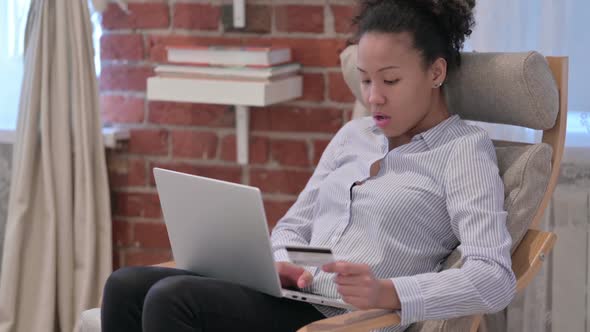 Online Shopping Payment Failure on Laptop By African American Woman