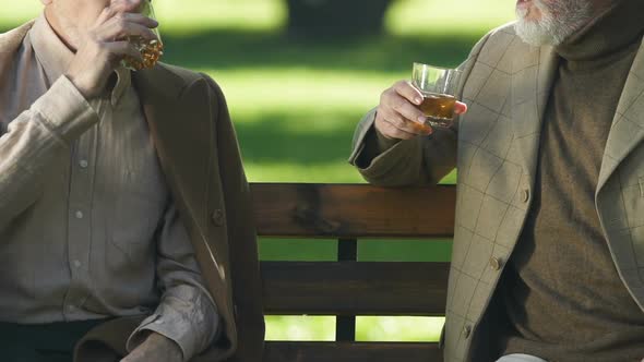Aged Successful Businessmen Enjoying Elite Whisky Taste, Sitting Outside, Rest