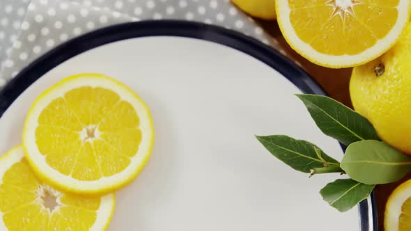 Close-up of fresh sweet limes in plate