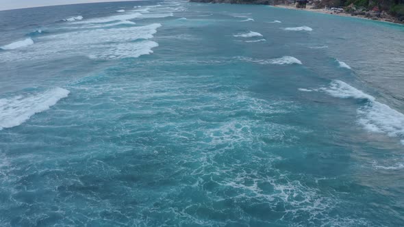 Aerial View Mesmerizing Frothy Blue Sea Waves Splashing Towards