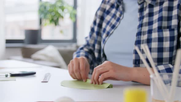 Woman Making Paper Craft at Home