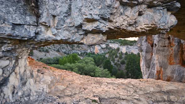 Sun Shining Through a Hole in a Rock Formation in River Wolves Canyon, Soria, Spain.