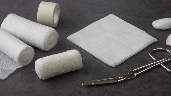 Medical bandages with scissors and sticking plaster. Medical equipment.