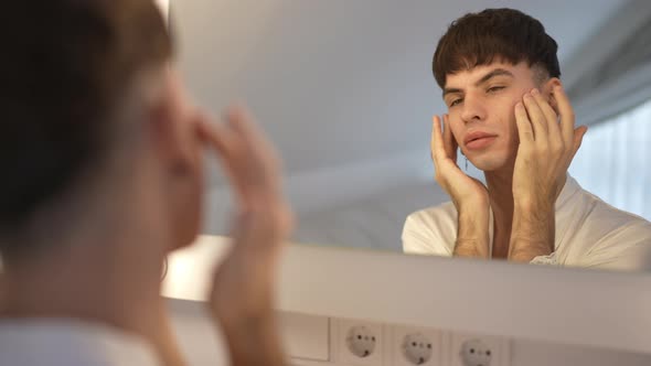 Reflection Confident Proud LGBT Woman Massaging Facial Skin with Hands in Slow Motion