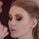 Beautiful girl has her makeup done in a beauty salon. - VideoHive Item for Sale