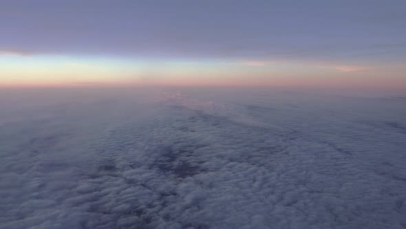 Aerial view to beautiful clouds from the airplane.