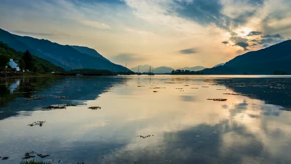 Bay with boats ast dusk in Scotland, 4k, timelapse