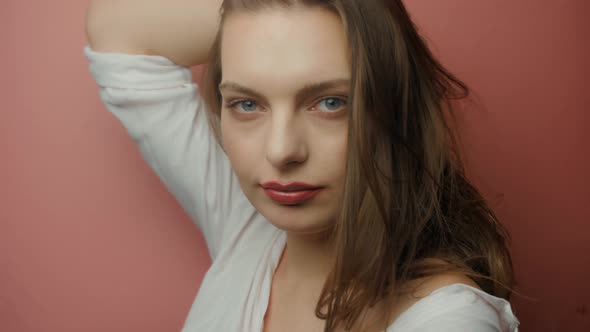 Happy woman on the red background