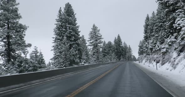 Driving on mountain road in winter