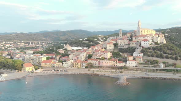 Aerial: flying around Cervo medieval town on the mediterranean coast, Liguria riviera, Italy