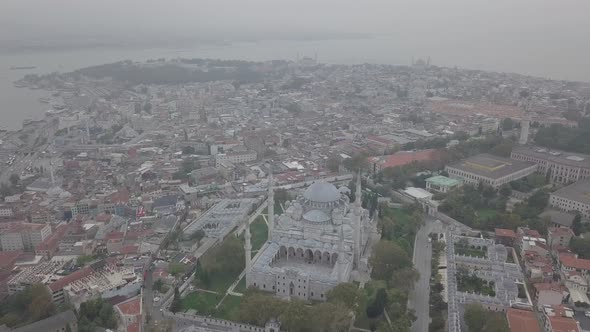 Aerial footage of Suleymaniye Mosque from a foggy day