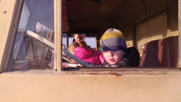 Children In Cabin Of The Truck
