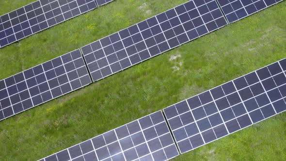 Flying Over Solar Cell Panels In Summer. - aerial