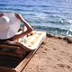 Beautiful Woman Sunbathing on a Beach at Tropical Travel Resort Enjoying Summer Holidays - VideoHive Item for Sale