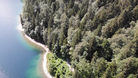 beautiful drone video of an lake and mountains, eibsee in bavaria