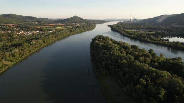 French river taken from drone with nuclear power plant in the background