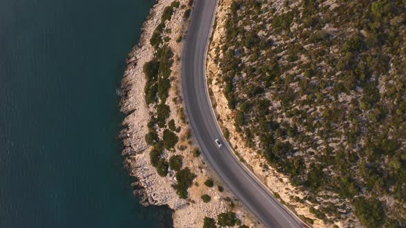 Aerial Drone View of Road Going Along the Mountains and Ocean or Sea