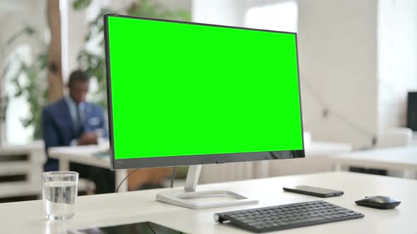 Close Up of Desktop with Green Chroma Key Screen