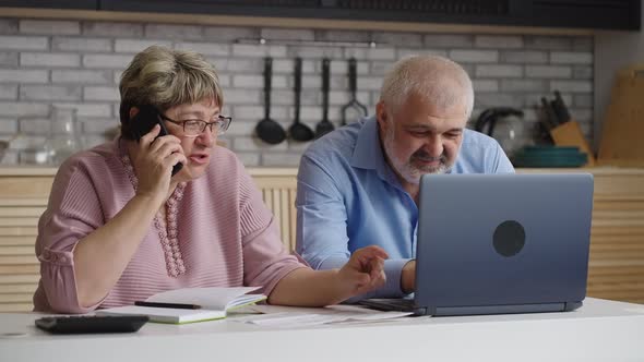 Elderly Man and Woman are Consulting with Financial and Insurance Consultant By Phone Call Woman is