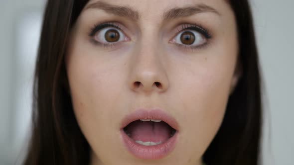 Shocked Face of Young Woman, Wondering