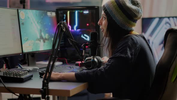 Portrait of Woman Streamer Looking at Camera After Playing Space Shooter