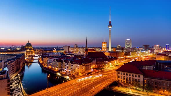 Night to Day Time Lapse of Berlin cityscape with spree river and tv tower, Berlin, Germany