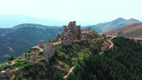 Aerial View of Ancient Castle on Mountain Hill Pine Forest on Mountain Slope