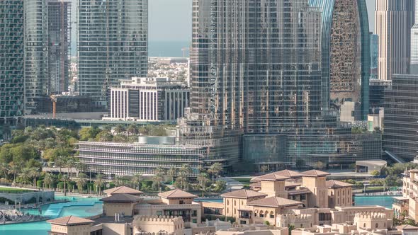 Famous Musical Fountain in Dubai with Skyscrapers in the Background Aerial Timelapse